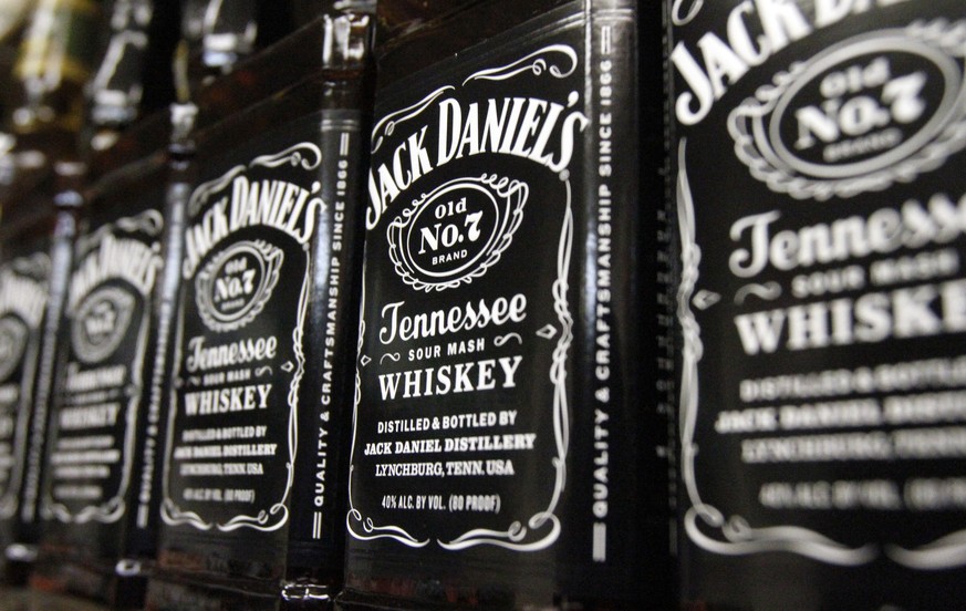 FILE - In this Dec. 5, 2011 photo, bottles of Jack Daniel's Old No. 7 brand whiskey line the shelves of a liquor outlet, in Montpelier, Vt. Jack Daniel's has turned back the latest challenge to a Tenn ...