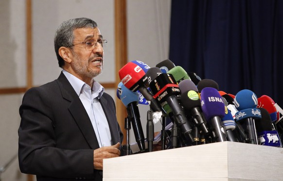 epa09193027 Iranian presidential candidate and former president Mahmoud Ahmadinejad speaks at a press conference after he registered his candidacy for the post of President of Iran, at the Interior Mi ...