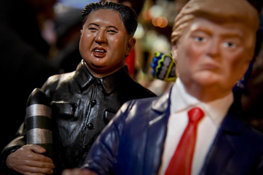 epa06389792 Small terracotta figurines depicting US President Donald J. Trump (R) and North Korean Leader Kim Jong-un are on display in the workshop of pastoral master craftsmen of San Gregorio Armeno ...