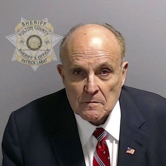 This booking photo provided by the Fulton County Sheriff&#039;s Office shows Rudy Giuliani on Wednesday, Aug. 23, 2023, in Atlanta, after he surrendered and was booked. Giuliani is charged alongside f ...