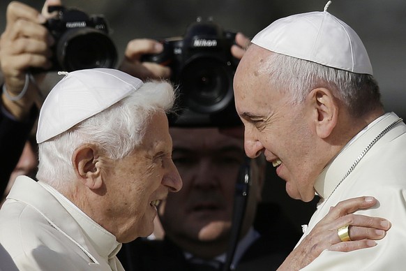 FILE - Pope Francis, right, hugs Emeritus Pope Benedict XVI prior to the start of a meeting with elderly faithful in St. Peter&#039;s Square at the Vatican on Sept. 28, 2014. Pope Francis has exposed  ...