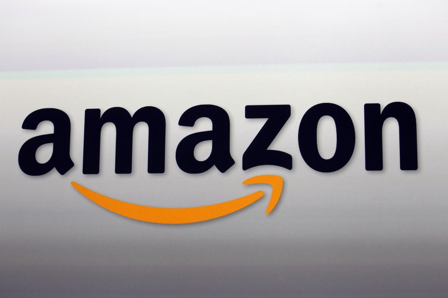 FILE - This Sept. 6, 2012, file photo shows the Amazon logo in Santa Monica, Calif. Amazon unveils new devices, Wednesday, Sept. 27, 2017. (AP Photo/Reed Saxon, File)