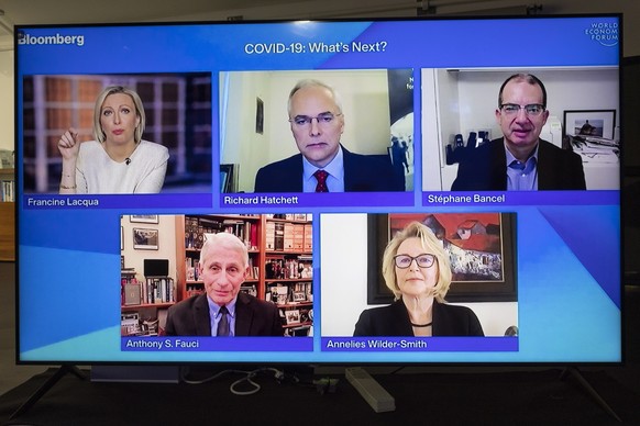 epa09691234 A screen shows moderator Francine Lacqua, CEO of the Coalition for Epidemic Preparedness and Innovations (CEPI) Richard Hatchett, CEO of Moderna Stephane Bancel, Director of the National I ...