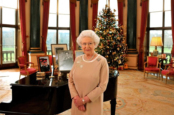 LONDON, UNITED KINGDOM - DECEMBER 22: Queen Elizabeth II stands in the music room of Buckingham Palace after recording her Christmas day message to the Commonwealth on December 22, 2008 in London, Eng ...