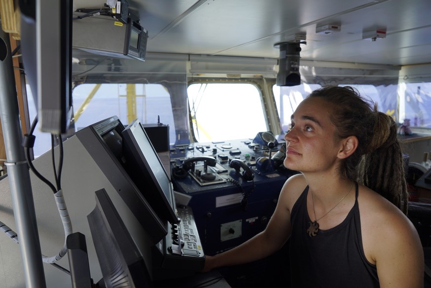 epa07676747 A handout photo made available by Sea-Watch on 27 June 2019 shows Sea-Watch 3 captain Carola Rackete on board the vessel at sea in the Mediterranean, 20 June 2019. Migrant rescue ship Sea- ...