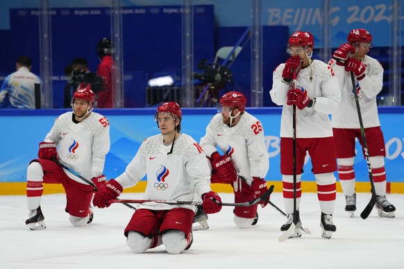 FILE - Russian Olympic Committee react after losing to Finland in the men's gold medal hockey game at the 2022 Winter Olympics, Sunday, Feb. 20, 2022, in Beijing. (AP Photo/Petr David Josek, File ...