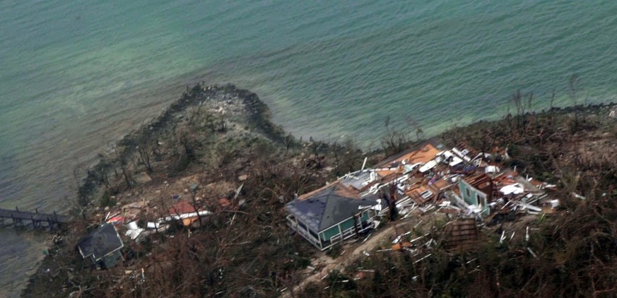 epa07815877 A handout photo made available by the US Coast Guard shows an aerial view of damaged structures in the Bahamas, 03 September 2019, seen from a Coast Guard Elizabeth City C-130 aircraft aft ...