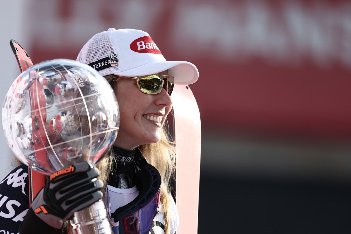 FILE - United States' Mikaela Shiffrin celebrates winning the women's overall World Cup skiing title, at the Lillehammer World Cup Finals, in Hafjell, Norway, Wednesday, March 25, 2026. (AP  ...
