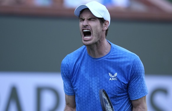 epa09521307 Andy Murray of Britain reacts while in action against Alexander Zverev of Germany during their Men&#039;s Singles Round of 32 match at the BNP Paribas Open tennis tournament at the Indian  ...