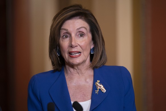 Speaker of the House Nancy Pelosi, D-Calif., welcomes Prime Minister Kyriakos Mitsotakis of Greece before a bipartisan meeting with congressional leaders, at the Capitol in Washington, Wednesday, Jan. ...