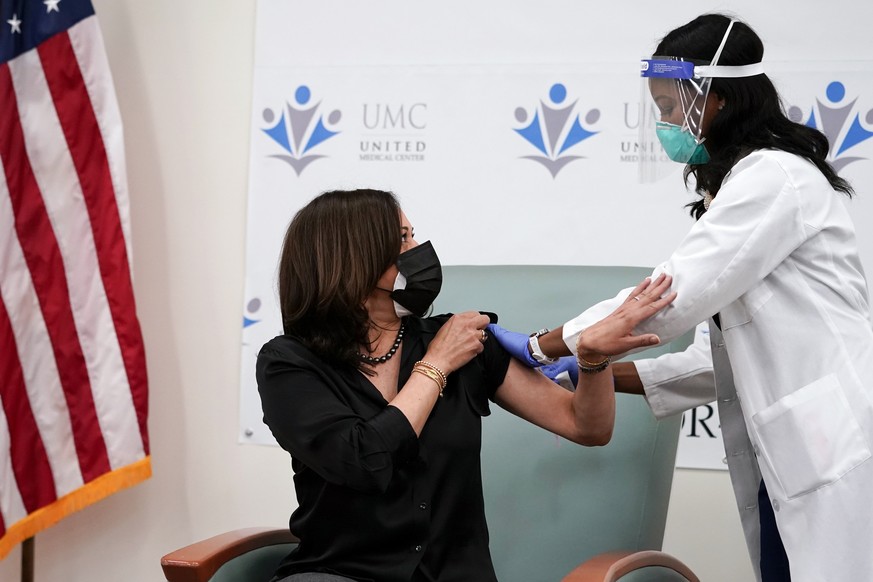 Vice President-elect Kamala Harris thanks nurse Patricia Cummings after she received the Moderna COVID-19 vaccine from Cummings, Tuesday Dec. 29, 2020, at United Medical Center in southeast Washington ...