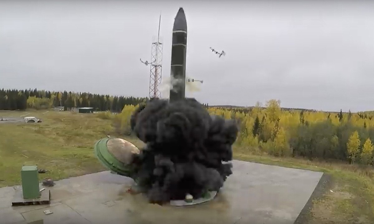 In this photo taken from undated footage distributed by Russian Defense Ministry Press Service, an intercontinental ballistic missile lifts off from a silo somewhere in Russia. The Russian military sa ...