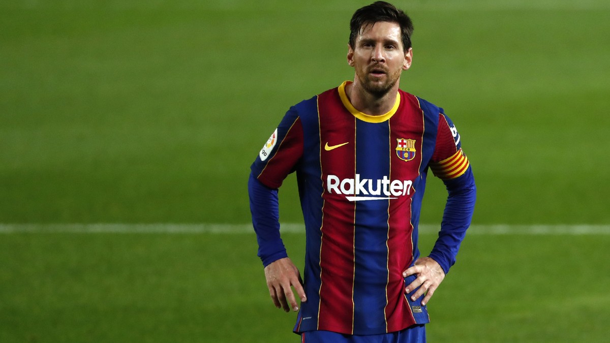 Barcelona's Lionel Messi gestures during the Spanish La Liga soccer match between FC Barcelona and Betis at the Camp Nou stadium in Barcelona, Spain, Saturday, Nov. 7, 2020. (AP Photo/Joan Monfor ...