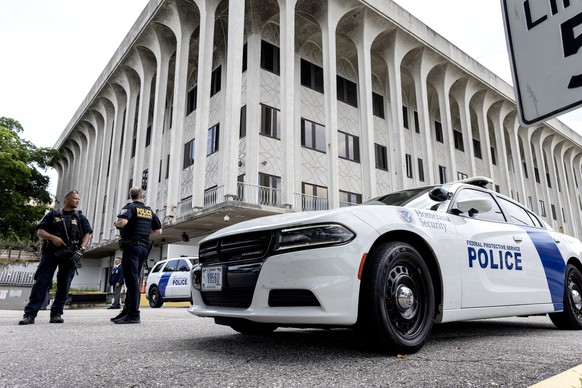 epa11608344 Homeland Security officers stand outside the Paul G. Rogers Federal Building and US Courthouse where Ryan Wesley Routh, identified as the suspect who was arrested after allegedly pointing  ...