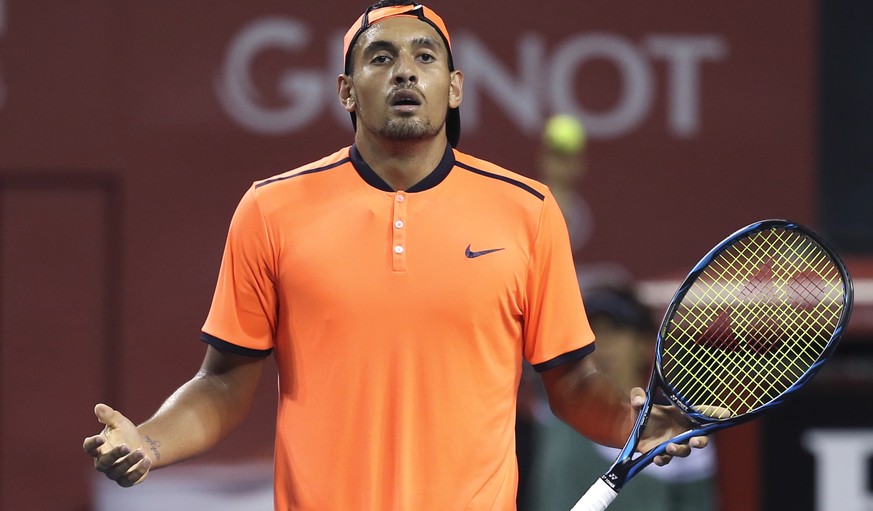 Australia&#039;s Nick Kyrgios reacts after getting a point against Gael Monfils of France during the semifinal match of Japan Open tennis championships in Tokyo, Saturday, Oct. 8, 2016. (AP Photo/Koji ...
