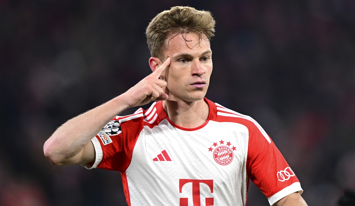Bayern's Joshua Kimmich celebrates after scoring his side's opening goal during the Champions League quarter final second leg soccer match between Bayern Munich and Arsenal at the Allianz Ar ...