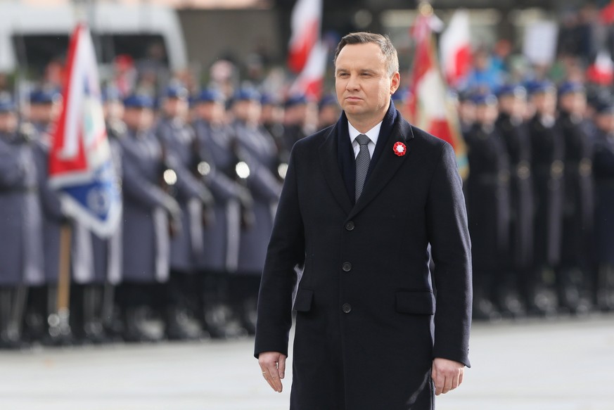 epa06322174 President of Poland Andrzej Duda during a ceremony commemorating Polish independence Day at the Tomb of the Unknown Soldier at the Jozef Pilsudski Square in Warsaw, Poland, 11 November 201 ...