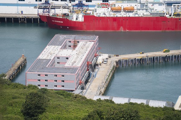 The Bibby Stockholm accommodation barge at Portland Port in Dorset, England, Tuesday August 1, 2023. The British Home Office have said around 50 asylum seekers would board the Bibby Stockholm, with th ...