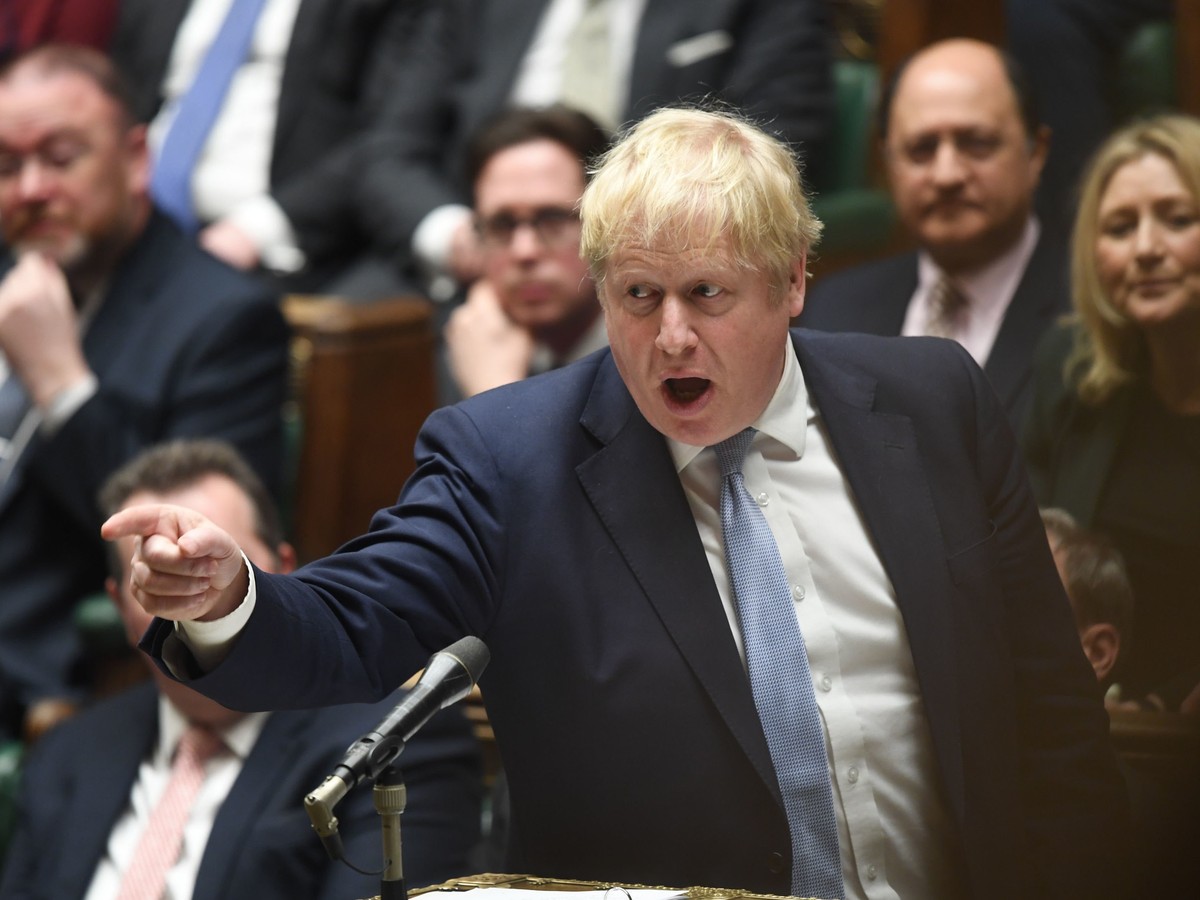 In this photo made available by UK Parliament, Britain's Prime Minister Boris Johnson speaks in the Houses of Commons, London, Monday Jan. 31, 2022. Boris Johnson apologized for lockdown-flouting ...