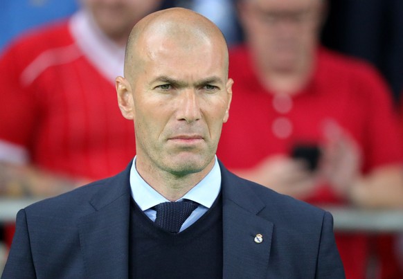 epa06765475 Real Madrid coach Zinedine Zidane before kick-off of the UEFA Champions League final between Real Madrid and Liverpool FC at the NSC Olimpiyskiy stadium in Kiev, Ukraine, 26 May 2018. EPA/ ...