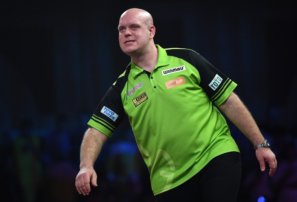 epa10387821 Dutch professional darts player Michael van Gerwen reacts during the PDC World Darts final against England&#039;s Michael Smith and at Alexandra Palace in London, Britain, 03 January 2023. ...