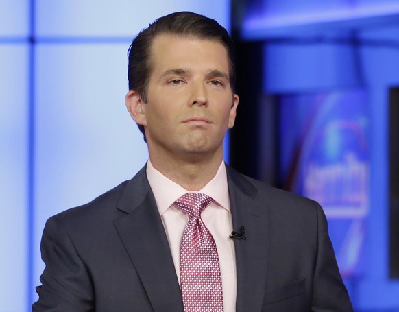 FILE - In this July 11, 2017, file photo, Donald Trump Jr. is interviewed by host Sean Hannity on his Fox News Channel television program, in New York. An email sent to President Donald Trump and Dona ...