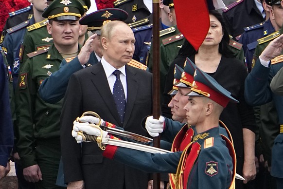 Russian President Vladimir Putin attends a wreath laying ceremony at the Tomb of Unknown Soldier in Moscow, Russia, Wednesday, June 22, 2022, marking the 81st anniversary of the Nazi invasion of the S ...