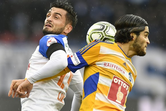 Der Grasshopper Bujar Lika, links, gegen den Luzerner Francisco Rodriguez, rechts, beim Fussballspiel der Super League Grasshopper Club Zuerich gegen den FC Luzern im Stadion Letzigrund in Zuerich am  ...