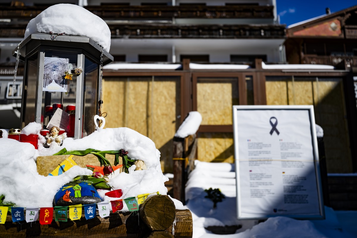epa12864312 Snow covers the entrance to the 'Le Constellation' bar, three months after the tragedy, in Crans-Montana, Switzerland, 01 April 2026. Forty-one people, mostly teenagers, lost the ...