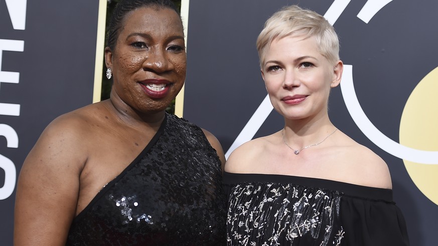 Tarana Burke, left, and Michelle Williams arrive at the 75th annual Golden Globe Awards at the Beverly Hilton Hotel on Sunday, Jan. 7, 2018, in Beverly Hills, Calif. (Photo by Jordan Strauss/Invision/ ...