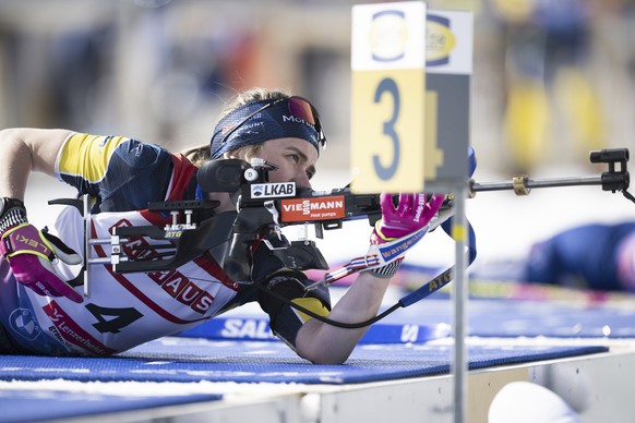 Elvira Oeberg of Sweden shoots, during the women&#039;s mass start race at the IBU Biathlon World Championships, Sunday, Feb. 23, 2025, in Lenzerheide, Switzerland. (Gian Ehrenzeller/Keystone via AP)