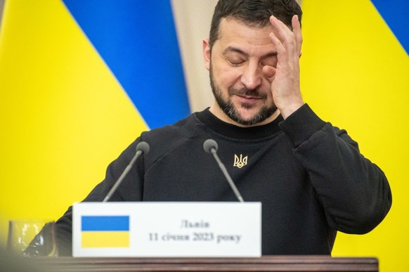 LVIV, UKRAINE - JANUARY 11: President of Ukraine Volodymyr Zelenskyy holds his head during a press conference following the tripartite meeting
on January 11, 2023 in Lviv, Ukraine. Ukrainian presiden ...