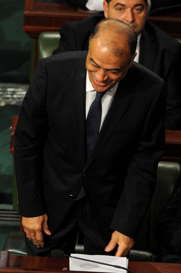 epa07426402 (FILE) - Tunisian Minister of Health Abderraouf Cherif (front) gestures during a session of the House of People&#039;s Representatives (HPR) dedicated to the vote of confidence on the new  ...