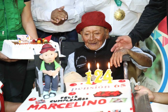 epa11266583 A handout photo made available by the Ministry of Development and Social Inclusion of Peru shows Marcelino Abad celebrating his 124th birthday in Lima, Peru, 08 April 2024. The Ministry of ...