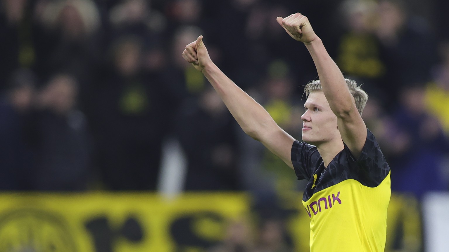 epa08226827 Dortmund&#039;s Erling Braut Haaland celebrates after the UEFA Champions League round of 16 first leg soccer match between Borussia Dortmund and Paris Saint-Germain in Dortmund, Germany, 1 ...