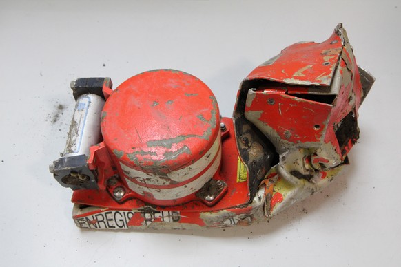 This photo provided in Paris, Wednesday, March 25, 2015 by the BEA, the French Air Accident Investigation Agency, shows the voice data recorder of the Germanwings jetliner that crashed Tuesday in the  ...