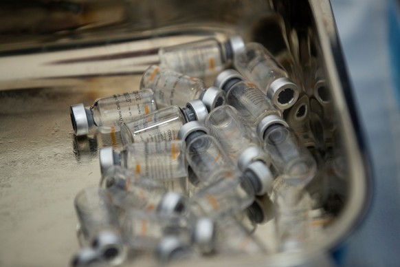epa09153442 A view of several vials of the Chinese Sinovac vaccine against COVID-19, at a vaccination center in Santiago, Chile, 22 April 2021. Chile has spent weeks with an ICU occupancy rate above 9 ...