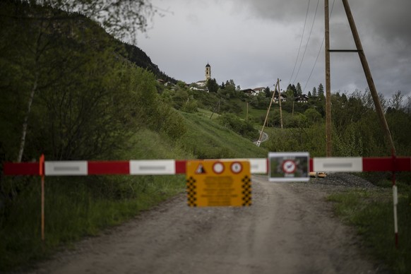 epa10623672 A road block in front of the village Brienz/Brinzauls beneath the &#039;Brienzer Rutsch&#039; after evacuation, in Graubuenden, Switzerland, 12 May 2023. Two million cubic metres of rock f ...