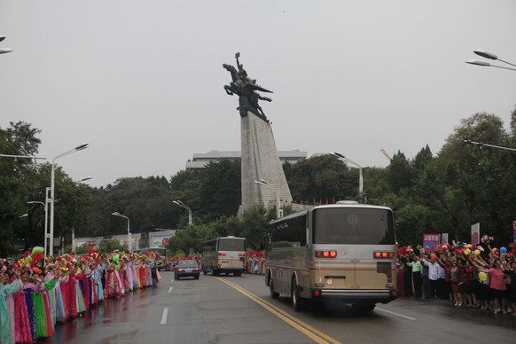 In this Wednesday, Sept. 6, 2017 photo, Pyongyang residents welcome contributors to their country’s sixth underground nuclear test, in Pyongyang, North Korea. The test of what Pyongyang claims was an  ...