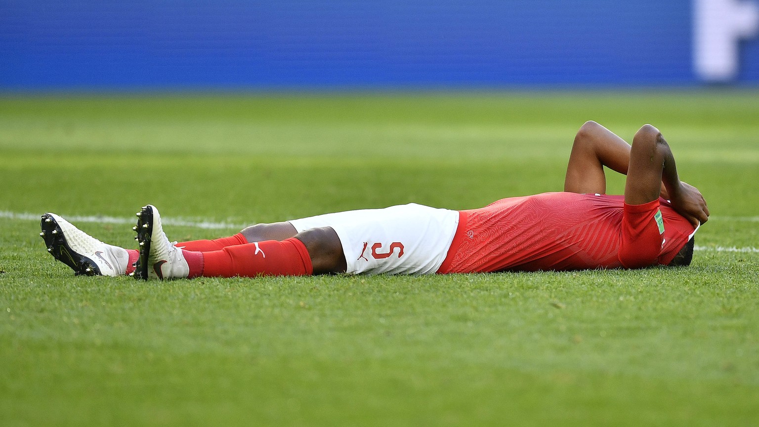 Switzerland&#039;s Manuel Akanji reacts after his team lost the round of 16 match between Switzerland and Sweden at the 2018 soccer World Cup in the St. Petersburg Stadium, in St. Petersburg, Russia,  ...