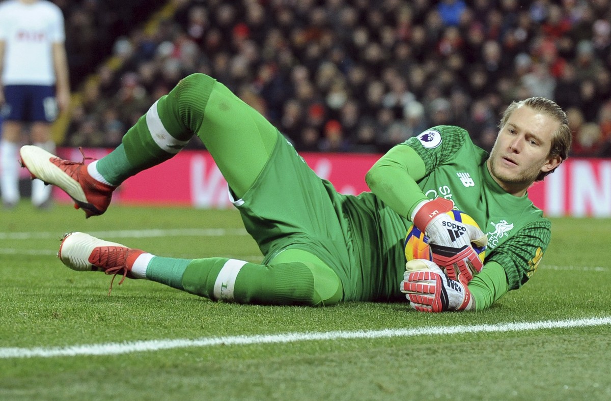 FILE - In this Feb. 4, 2018, file photo, Liverpool's Loris Karius lies on the field during an English Premier League soccer match against Tottenham Hotspur in Liverpool, England. Doctors based in ...