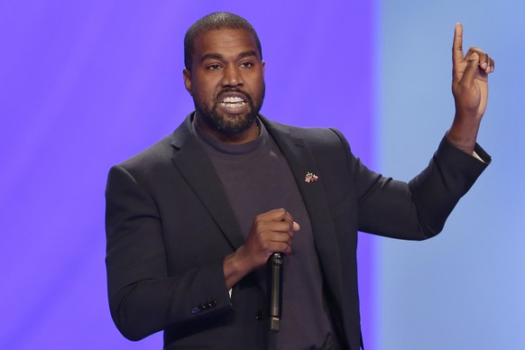 FILE - In this Sunday, Nov. 17, 2019, file photo, Kanye West answers questions during a service at Lakewood Church, in Houston. On Friday, Oct. 16, 2020, The Associated Press reported on stories circu ...
