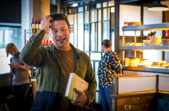 epa07588783 (FILE) - English chef Jamie Oliver at the presentation of his new cookbook '5 ingredients' held in his restaurant 'Jamie's Italian’ in The Hague, The Netherlands, 09 November 2017, reissue ...