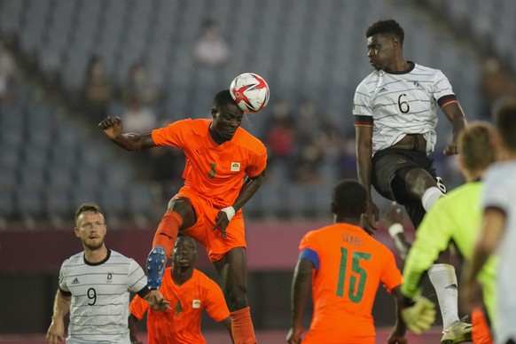Ivory Coast&#039;s Eric Bailly clears the ball against Germany during a men&#039;s soccer match at the 2020 Summer Olympics, Wednesday, July 28, 2021, in Rifu, Japan. (AP Photo/Andre Penner)