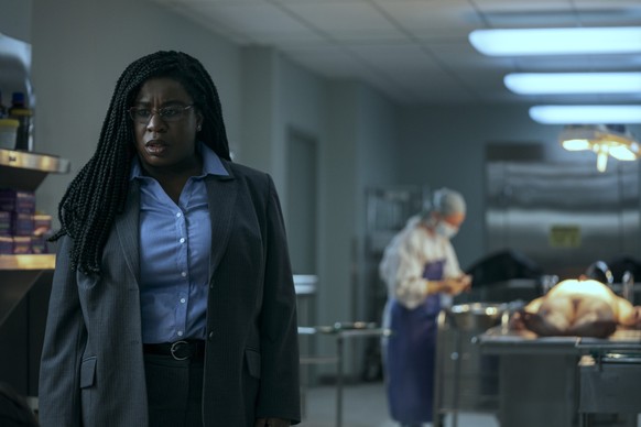 Painkiller. Uzo Aduba as Edie in episode 103 of Painkiller. Cr. Keri Anderson/Netflix © 2023