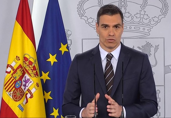 epa08439240 A handout Video-grab photo taken from La Moncloa Palace official broadcasting shows Spanish Prime Minister, Pedro Sanchez, as he addresses a press conference at La Moncloa Palace, in Madri ...