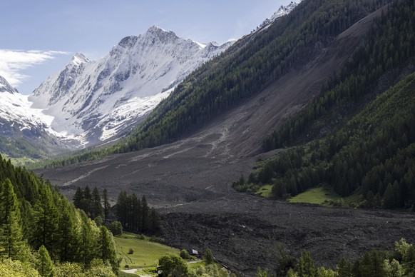 A massive debris avalanche is seen on Thursday, May 29, 2025, one day after the collapse of the Birch Glacier causing the demolishing of the village of Blatten in Switzerland. (Jean-Christophe Bott/Ke ...