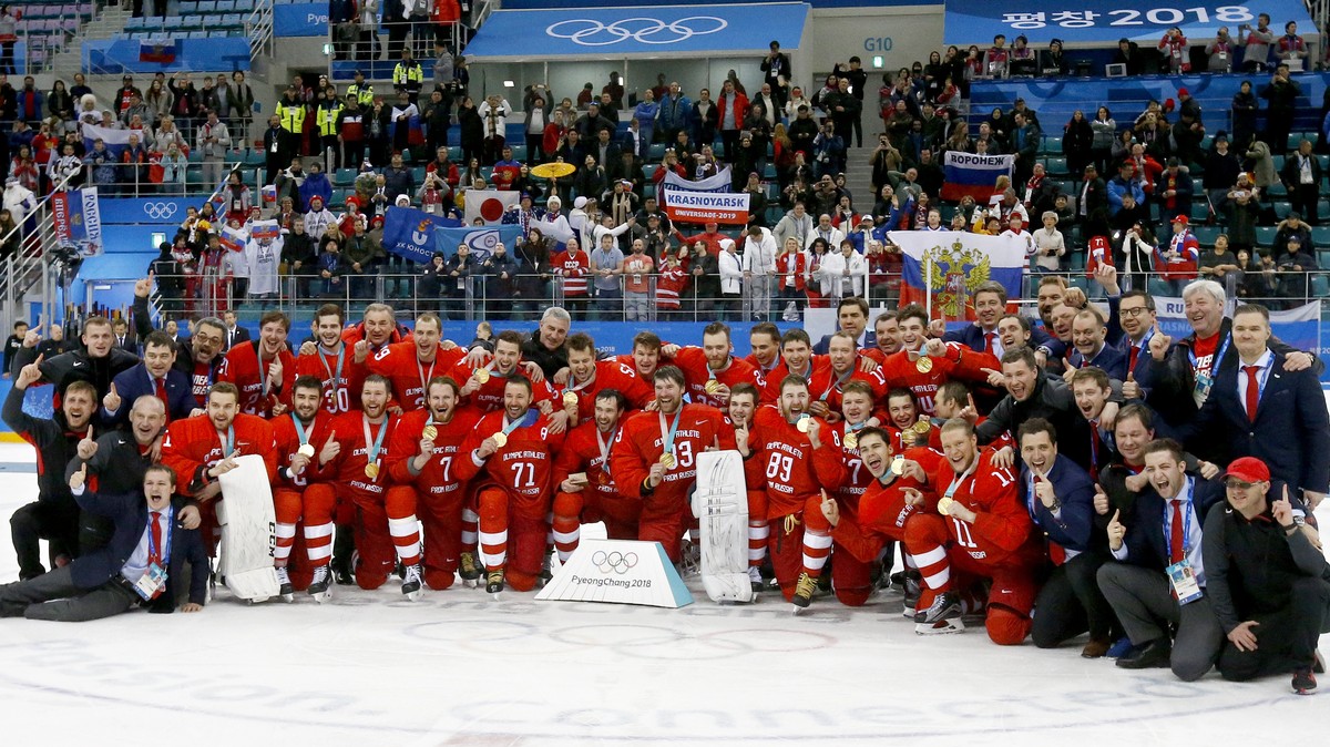 epa06563446 Team OAR poses for a photograph with their gold medals after winning in the Men's Ice Hockey Gold Medal Game between the Olympic Athlete from Russia (OAR) and Germany at the Gangneung ...