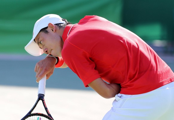 Japanese tennis player Kei Nishikori during a break against Spanish Rafael Nadal during their Olympic Games Olympische Spiele Olympia OS Rio 2016 Men s Singles Bronze Medal match at the Olympic Tennis ...