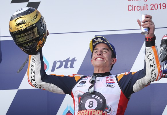 Spain&#039;s rider Marc Marquez of the Repsol Honda Team celebrates after winning Thailand&#039;s MotoGP and his 8th Moto GP Championship at the Chang International Circuit in Buriram, Thailand, Sunda ...